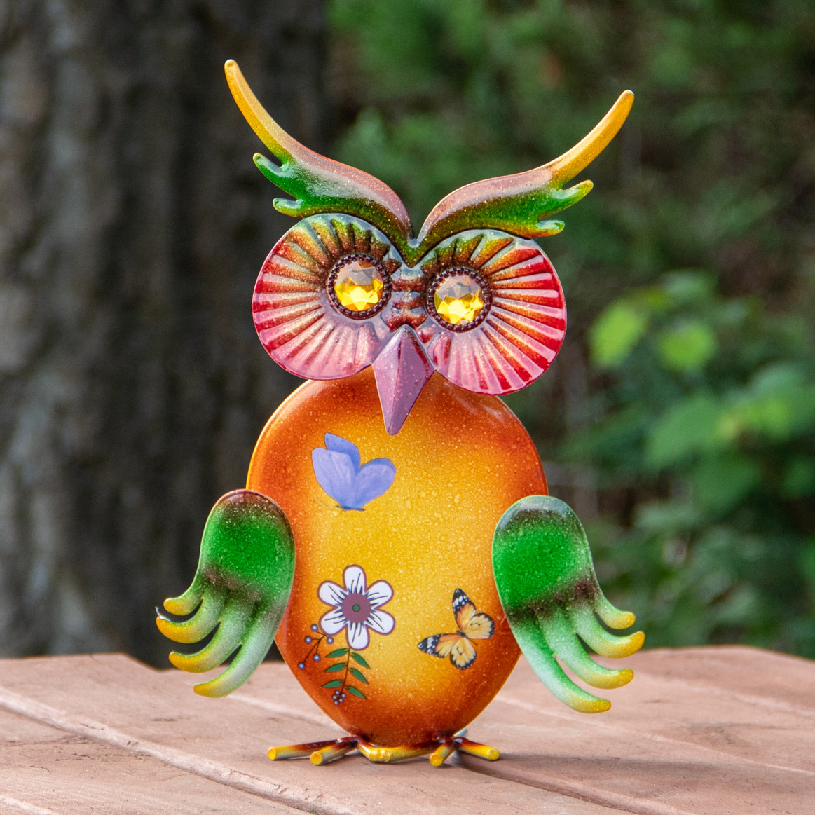 colorful metal owl garden sculpture with bobbing head