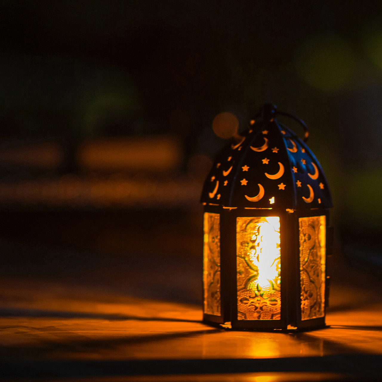 cutwork candle lantern at night