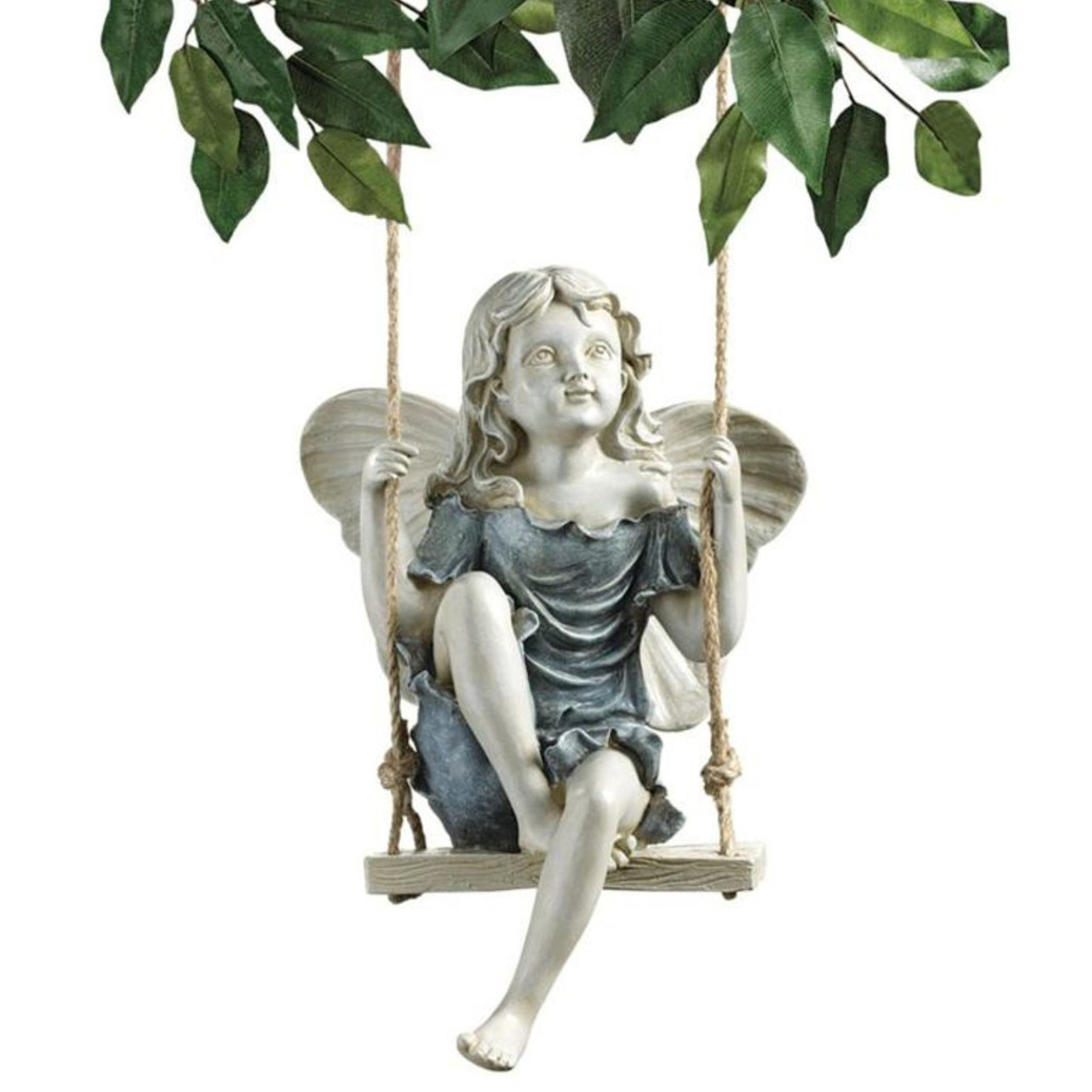 daydreaming garden fairy on a swing