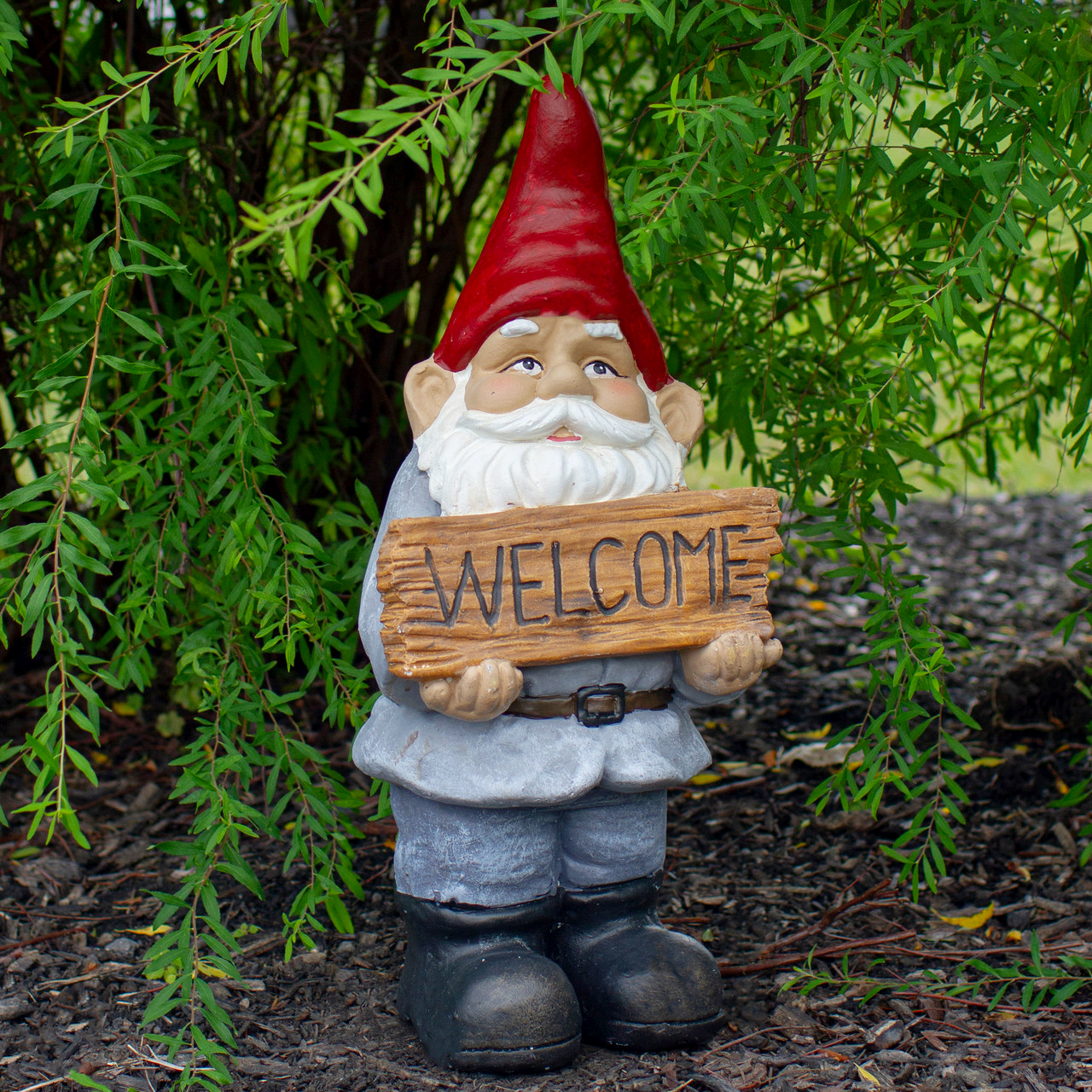standing garden gnome holding Welcome sign